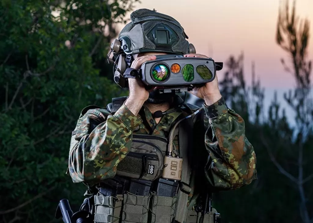 Soldier in the field holding AION-C Advanced target locator a