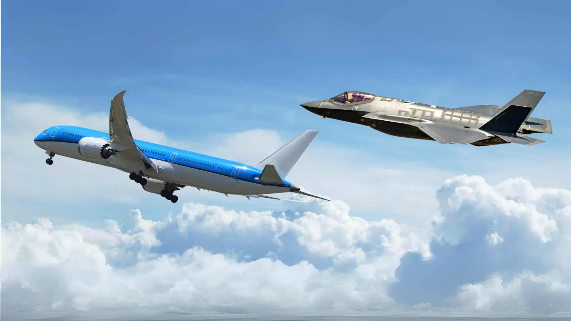 commercial plane and fighter jet flying in the sky