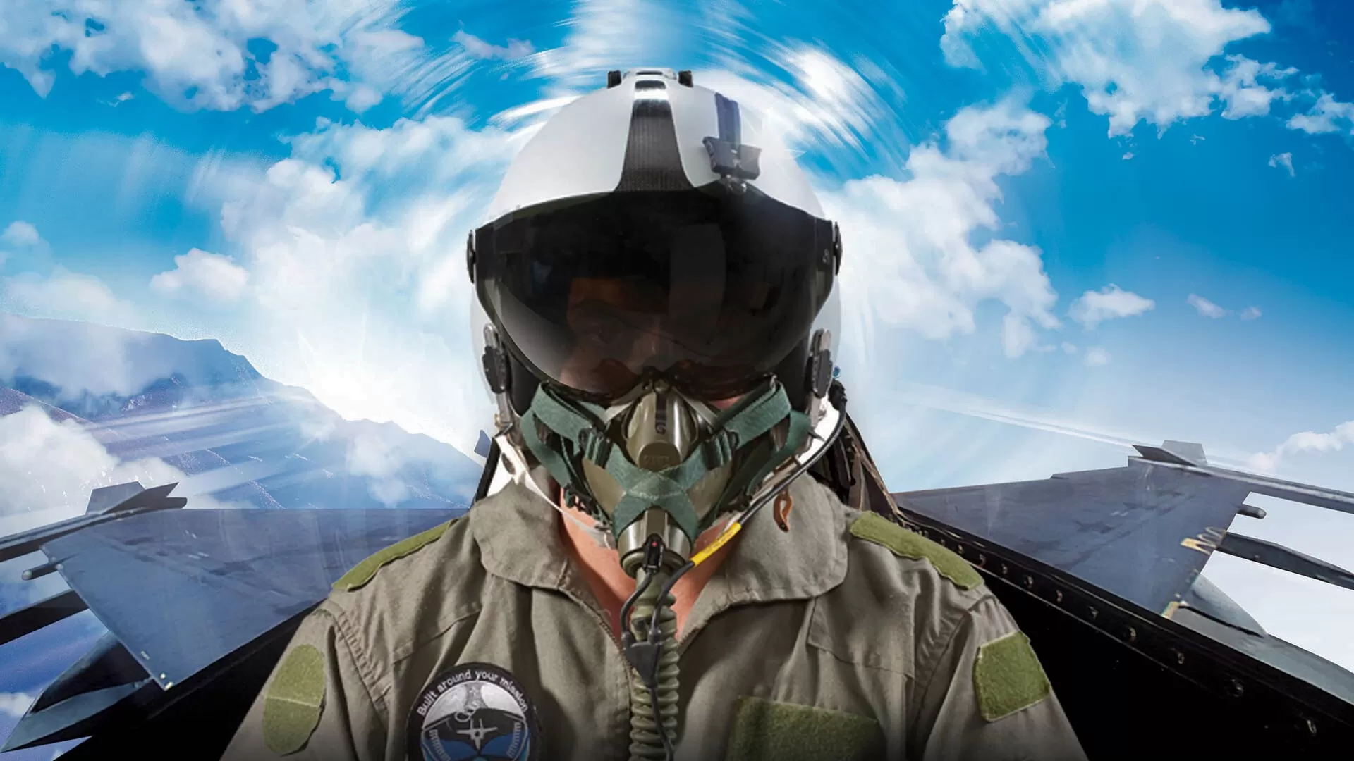 Pilot wearing helmet sitting in the cockpit