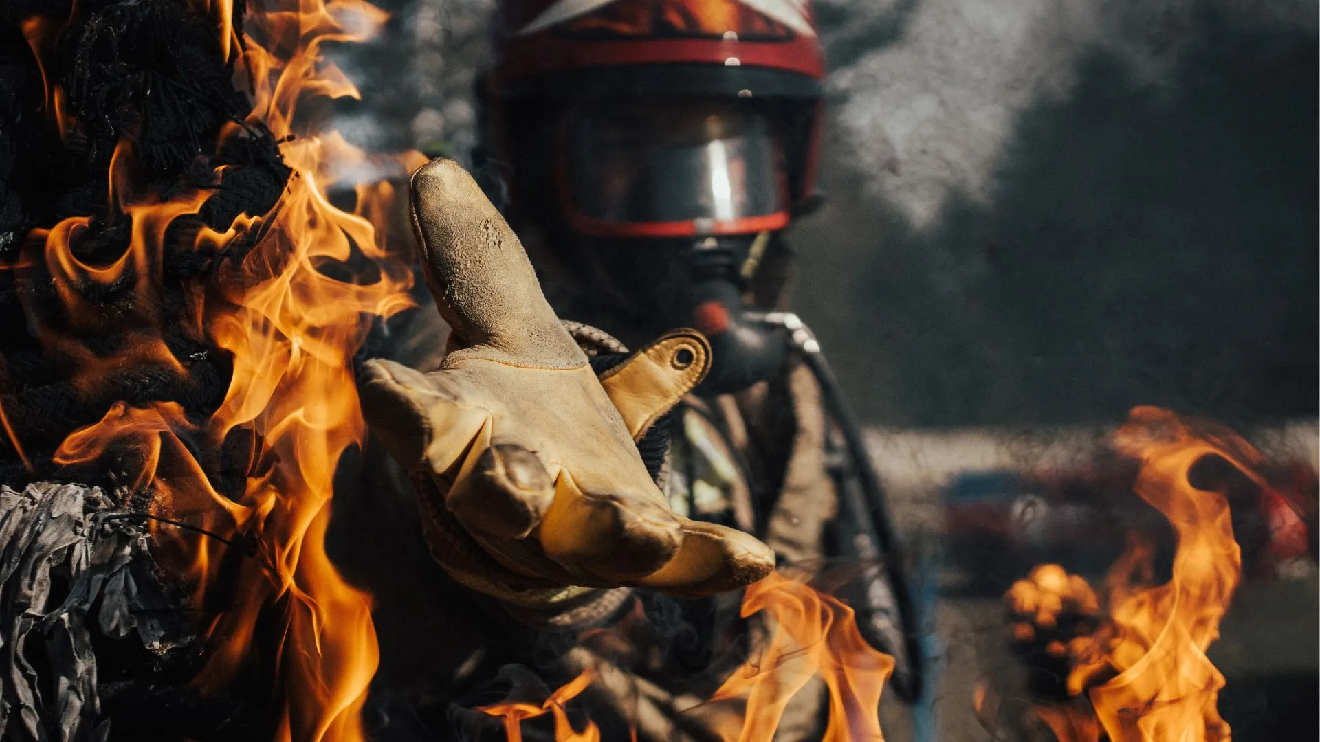 Firefighter reaching his hand