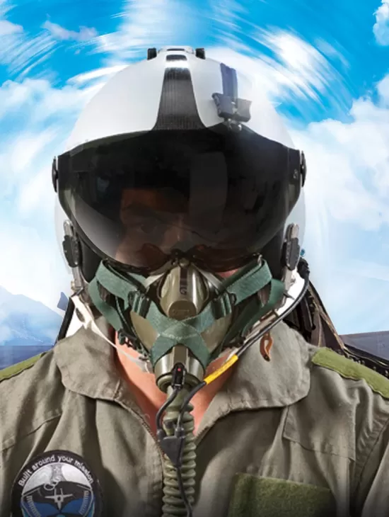 Pilot with helmet sitting in the cockpit