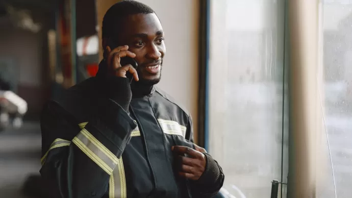 Firefighting first responder talking on phone